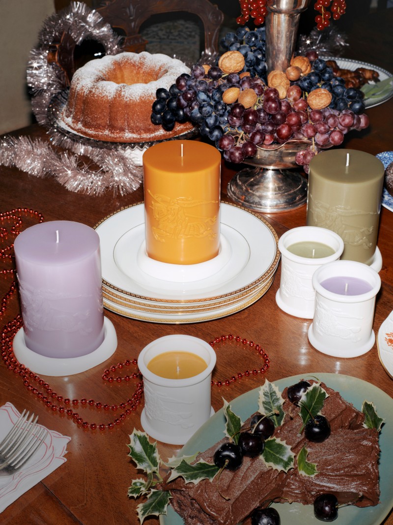 Burberry Festive Campaign featuring Burberry scented candles with Festive desserts and decoration.