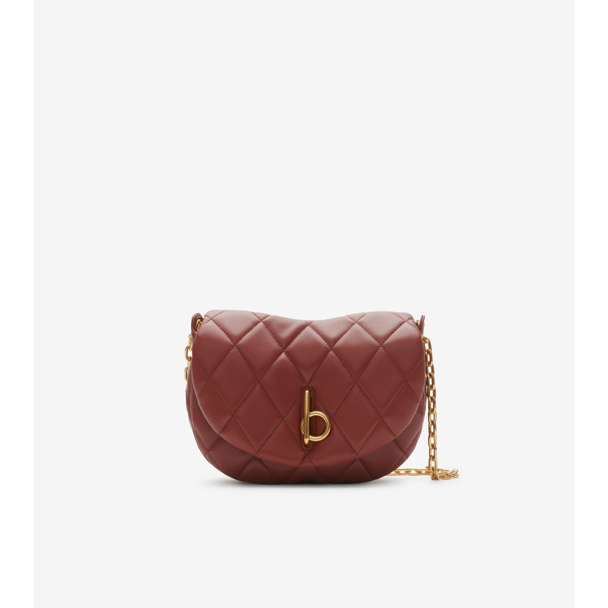 Shop Burberry Quilted Rocking Horse Bag In Rust