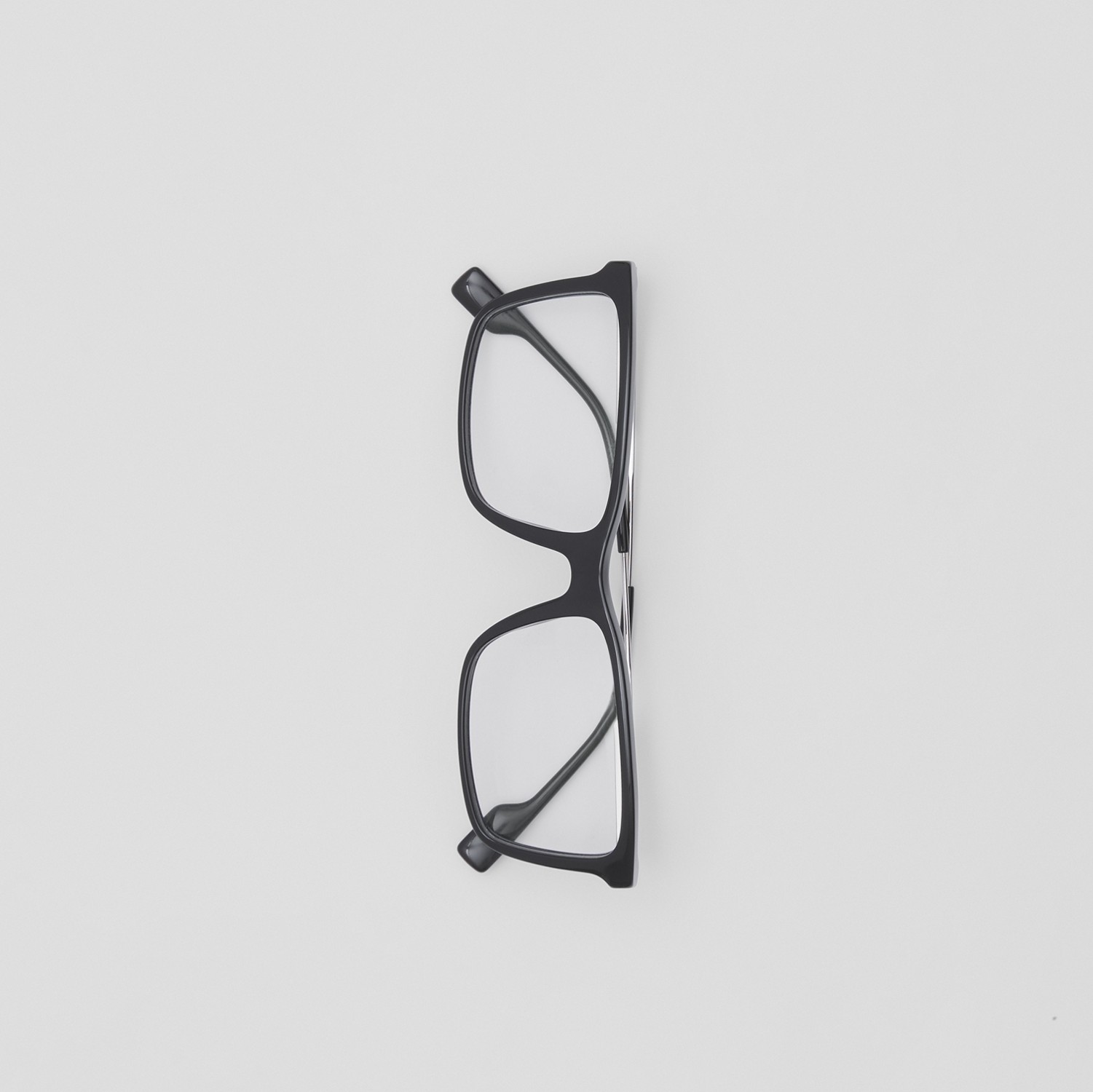 Monture rectangulaire à rayures iconiques pour lunettes de vue