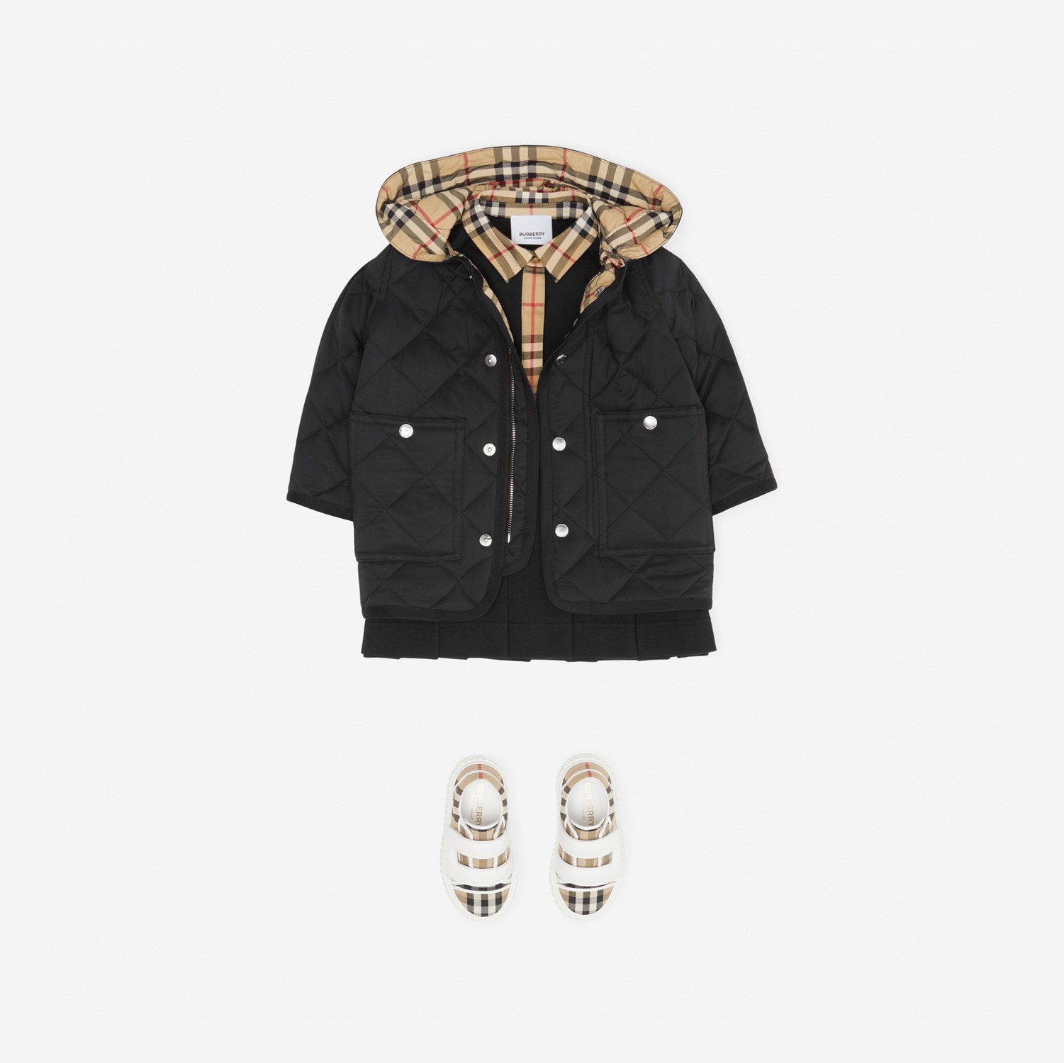 Manteau à capuche en nylon matelassé (Noir) - Enfant | Site officiel Burberry®