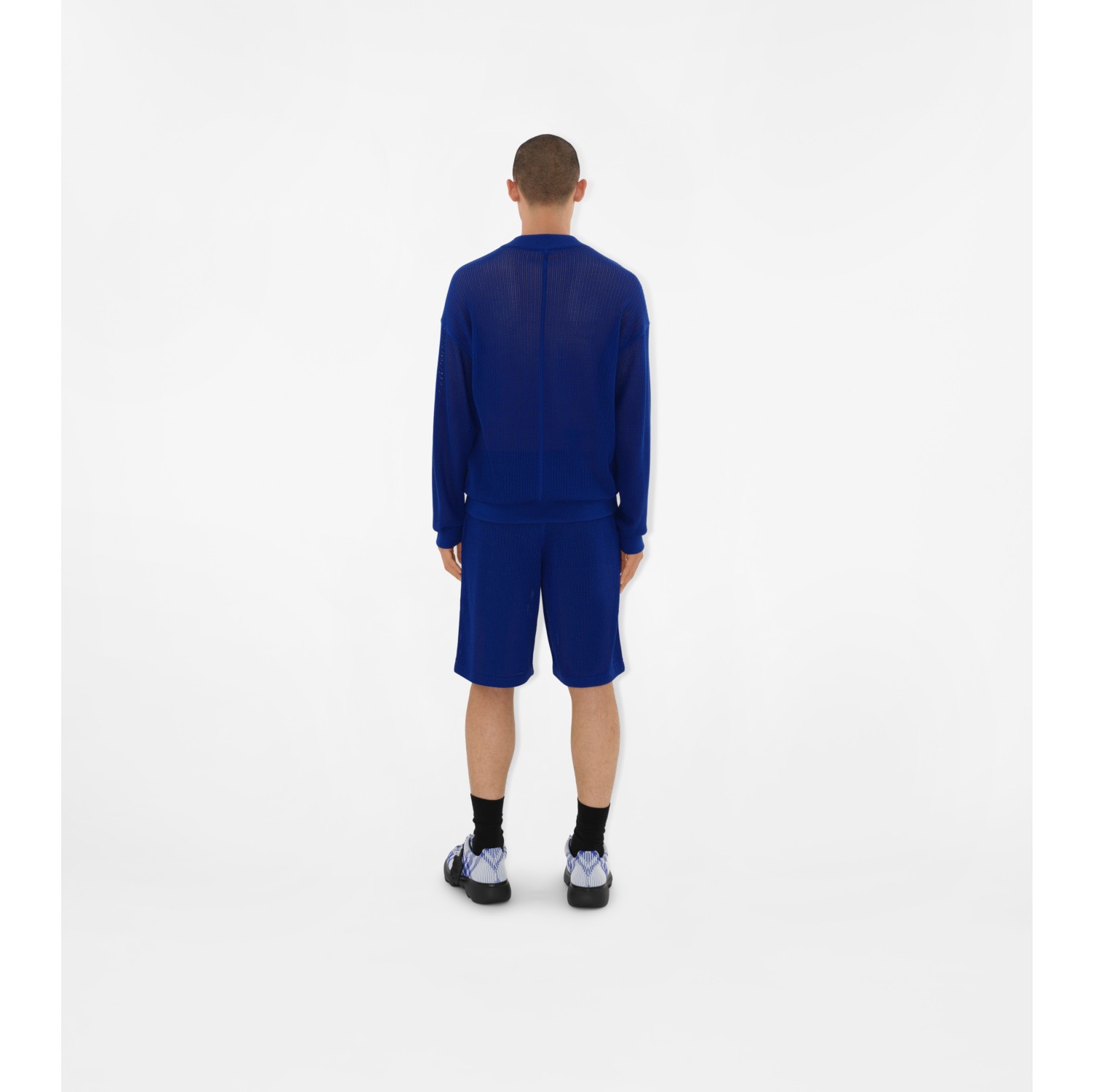 Pantalones cortos MAN Signature anchos de tela jersey con largo