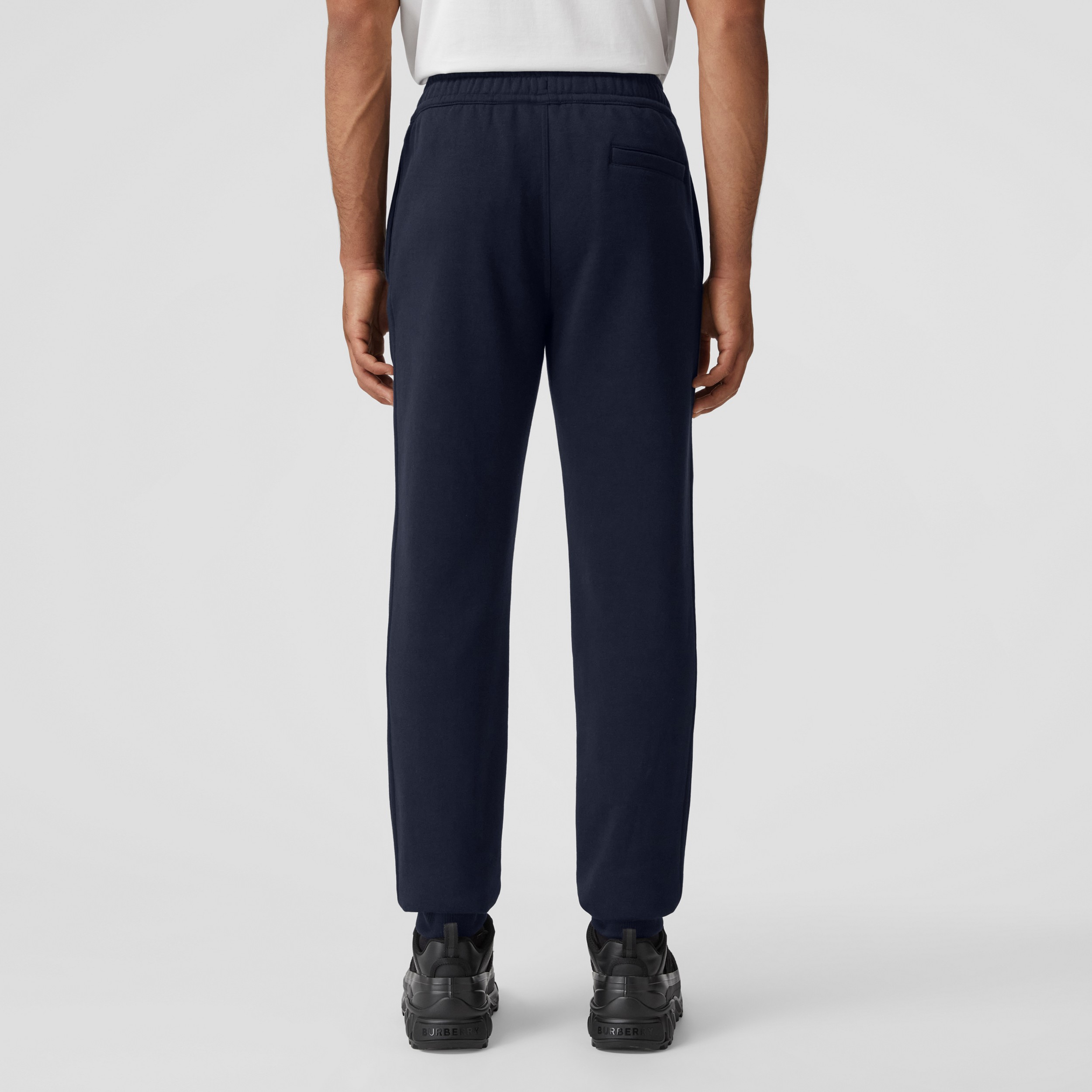 Calças jogger em algodão com estampa de logotipo (Azul Grafite Escuro) - Homens | Burberry® oficial - 3