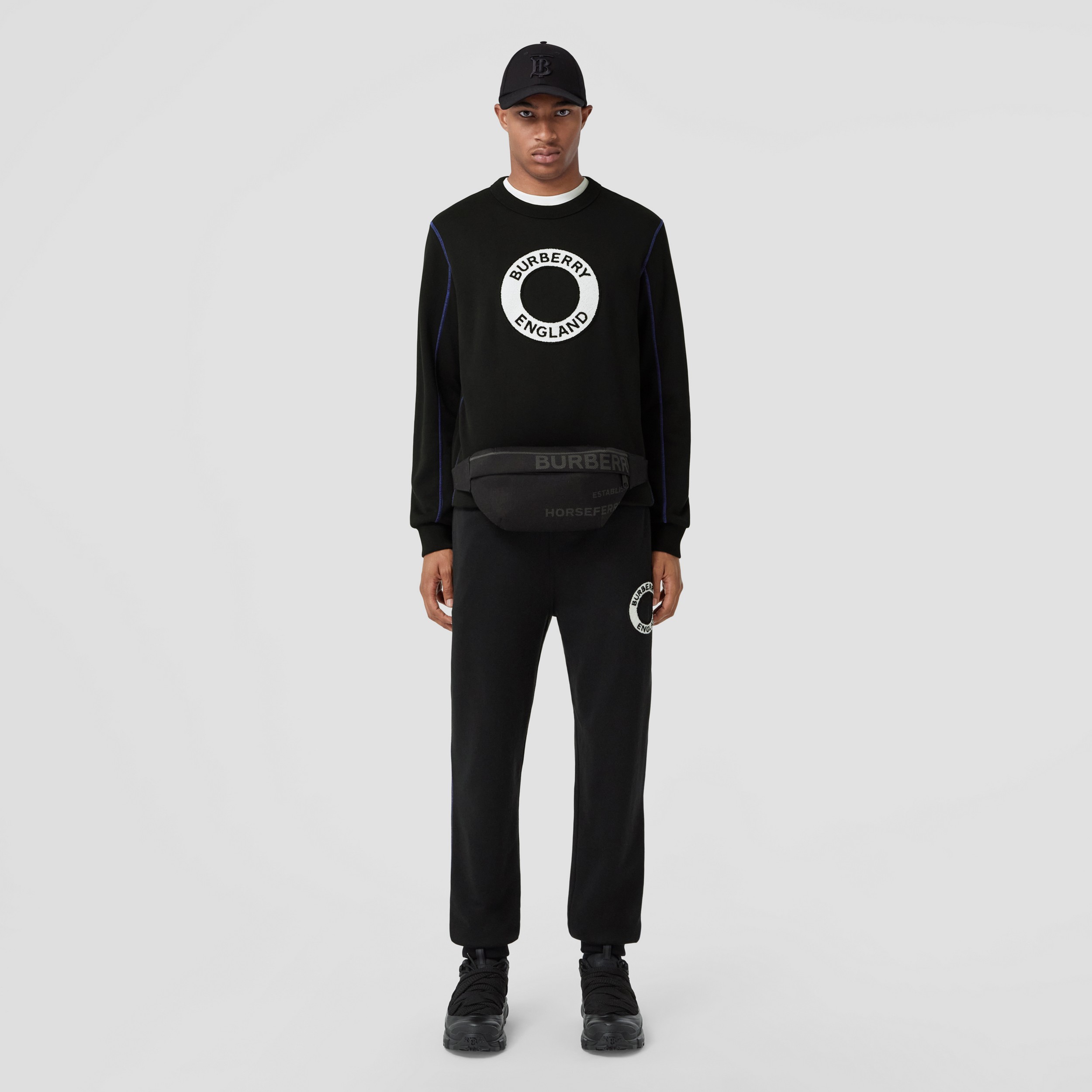 Logo Graphic Appliqué Cotton Jogging Pants in Black - Men | Burberry® Official - 1