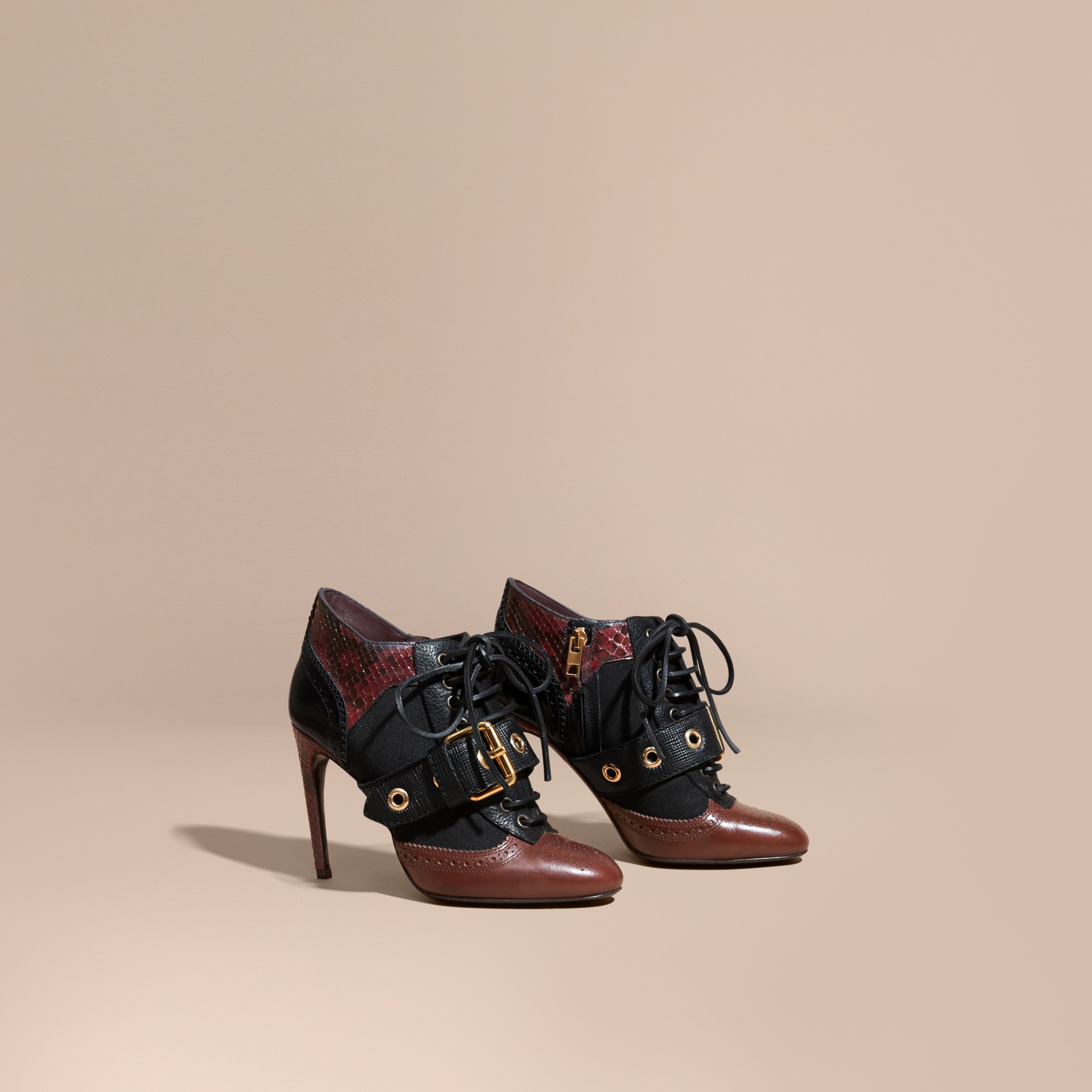 snakeskin buckle boots