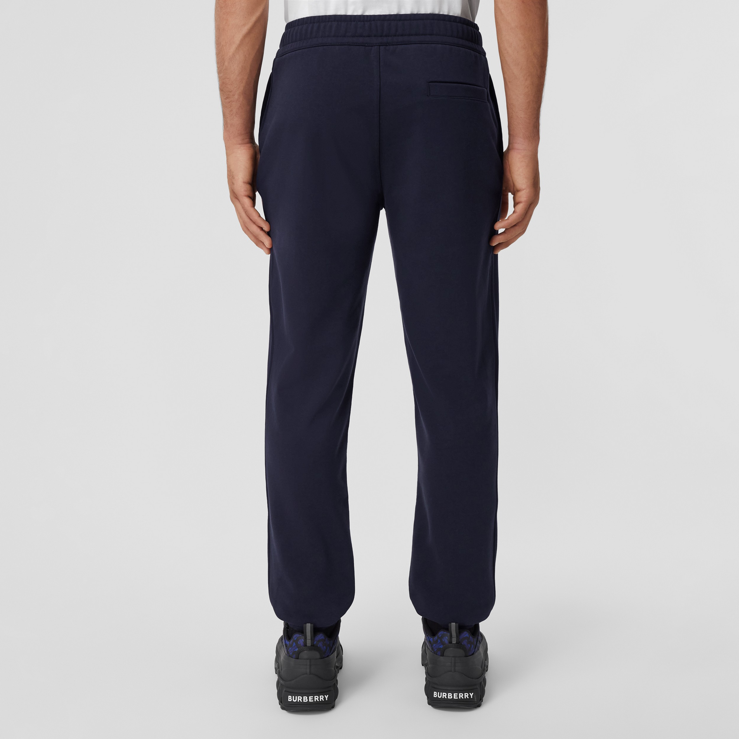 Calças jogger de algodão stretch com estampa de logotipo (Azul Carvão) - Homens | Burberry® oficial - 3