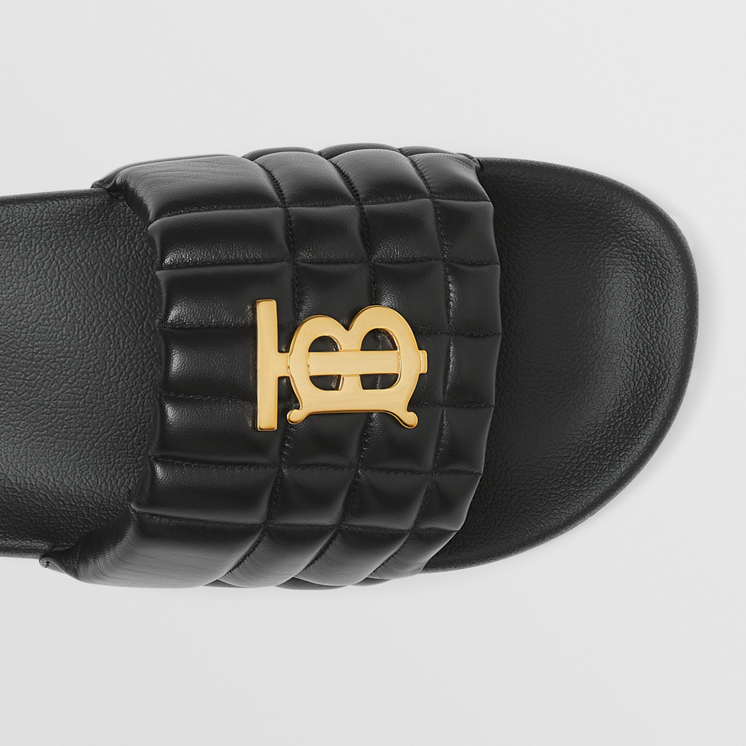 Monogram Motif Quilted Leather Slides in Black Men Burberry® Official