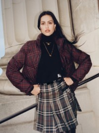 Shot of model Amelia Gray wearing Burberry Check Puffer Jacket with Burberry Check Kilt