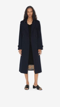 Woman wearing black Waterloo trench coat 