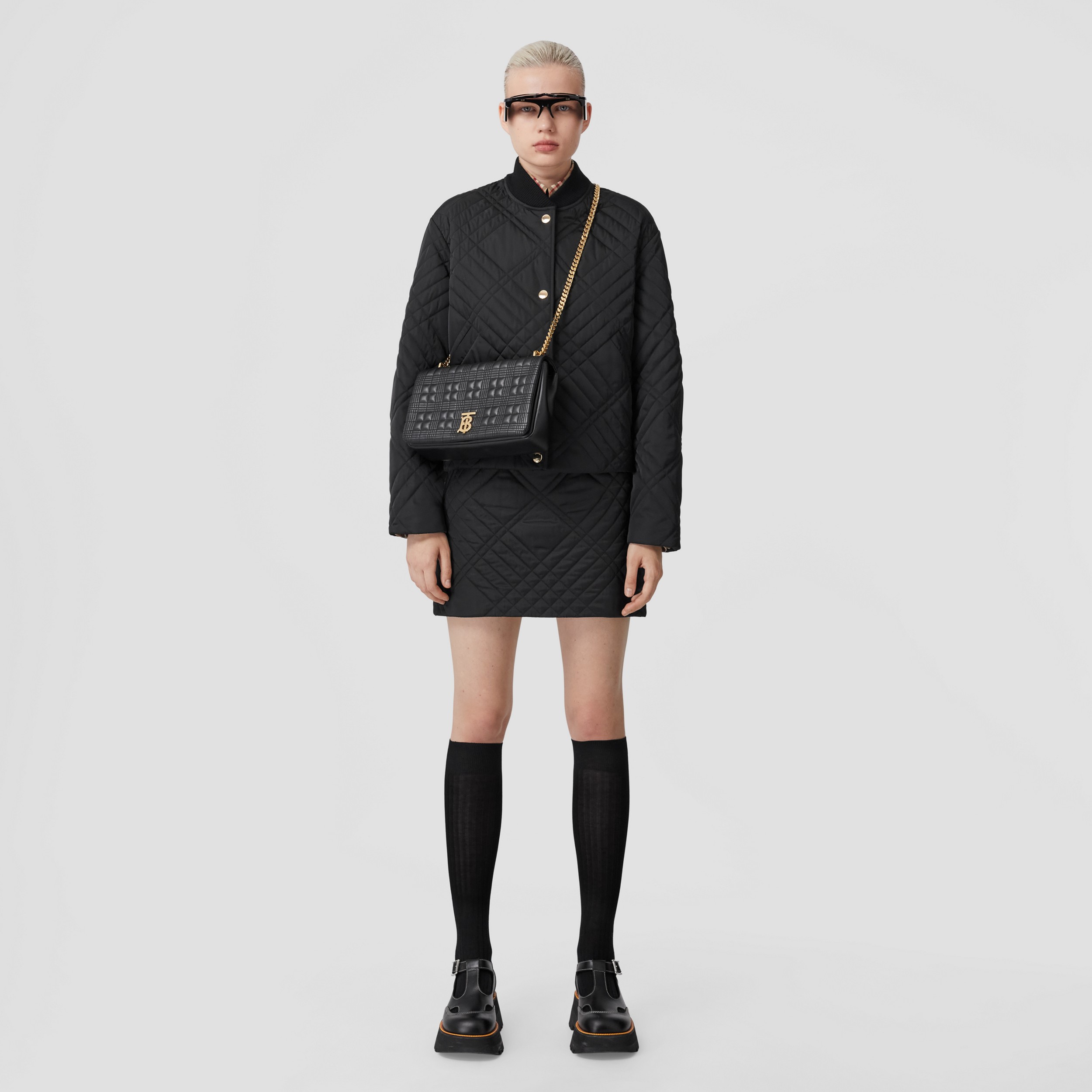 Check Quilted Nylon Mini Skirt in Black - Women | Burberry® Official - 1