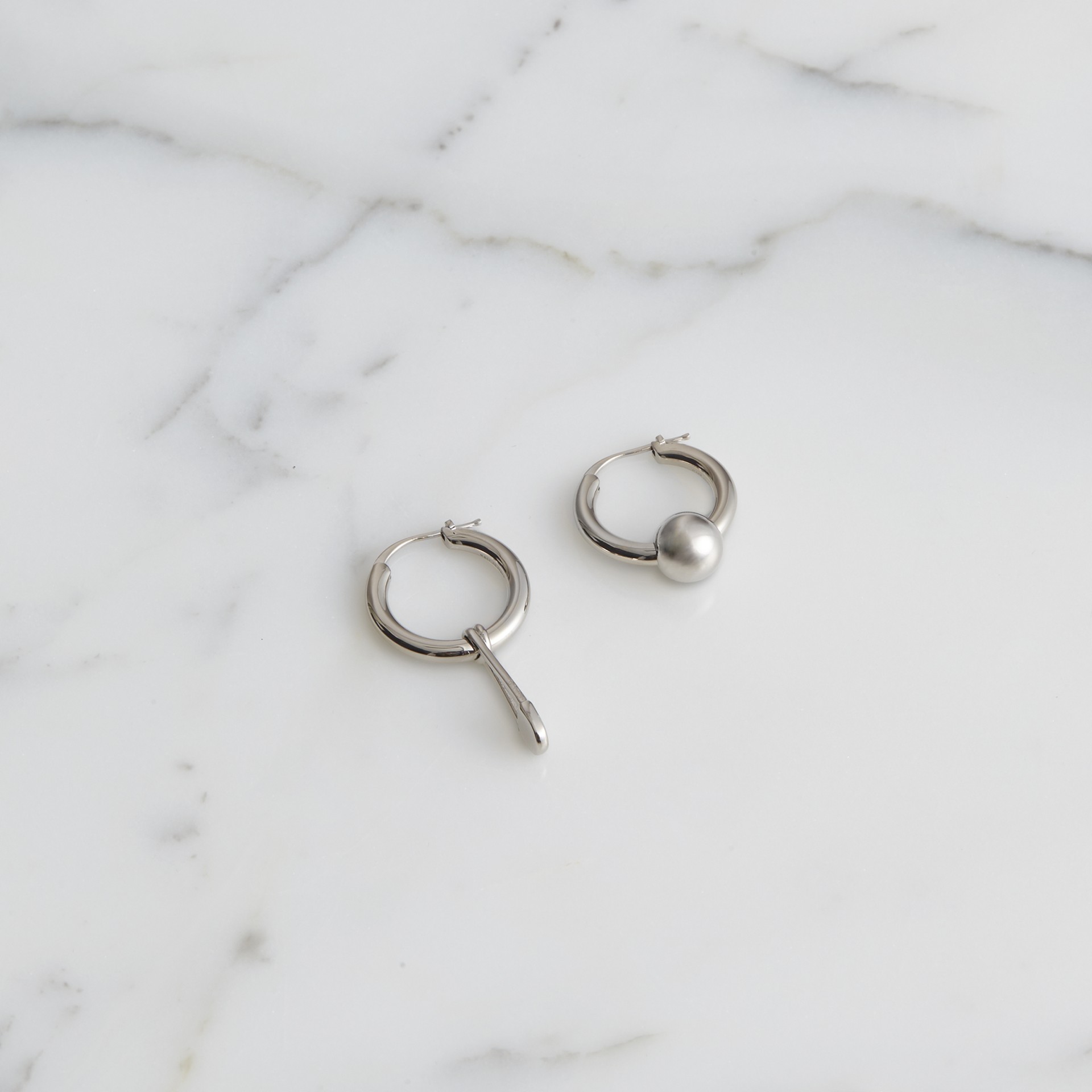 BURBERRY Kilt Pin and Charm Palladium-plated Hoop Earrings,40767821