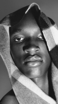 Brand 01 Campaign featuring model wearing a blanket