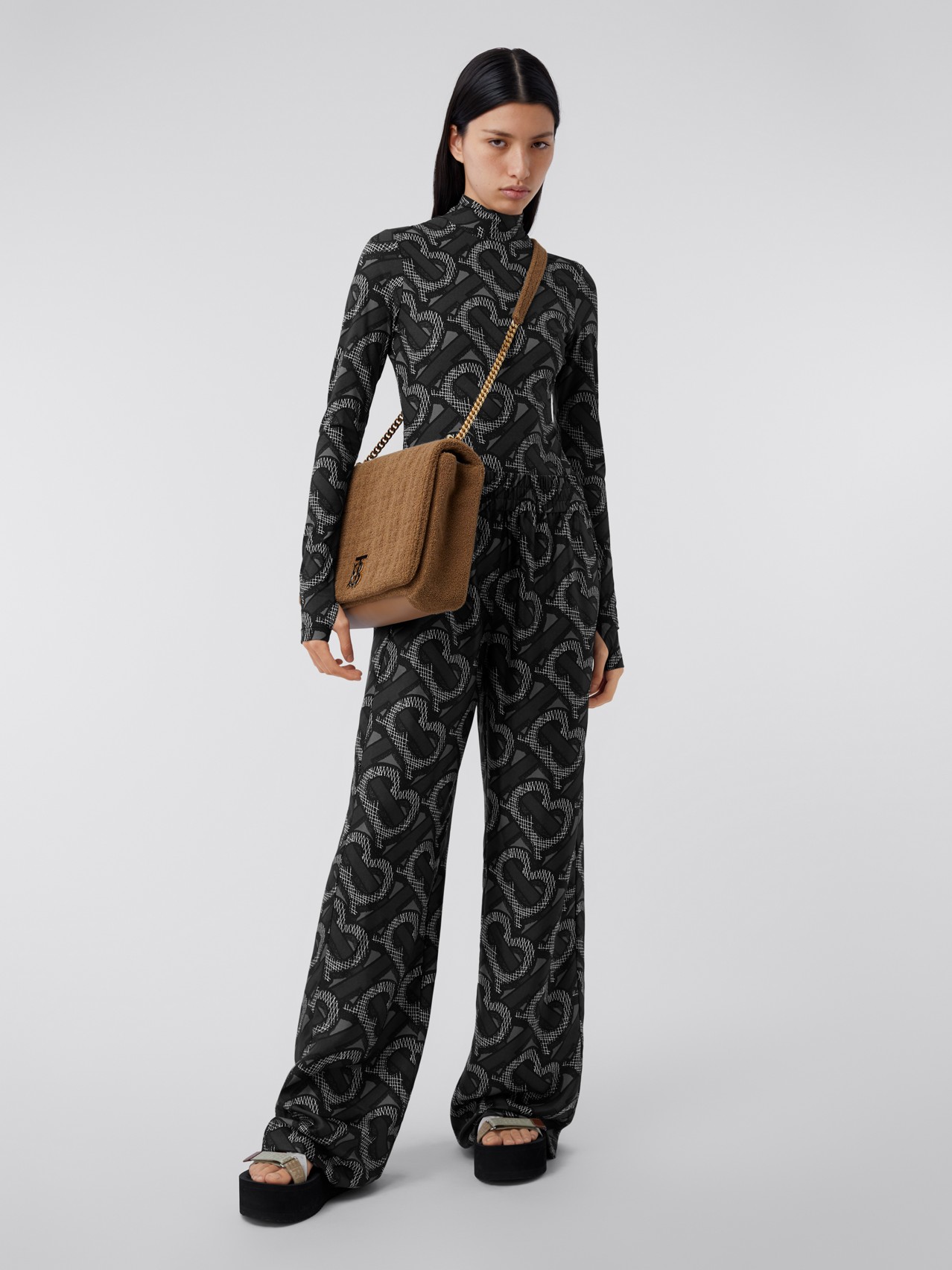 Monogram Print Stretch Nylon Turtleneck Bodysuit by Burberry, available on burberry.com for $490 Kendall Jenner Top SIMILAR PRODUCT