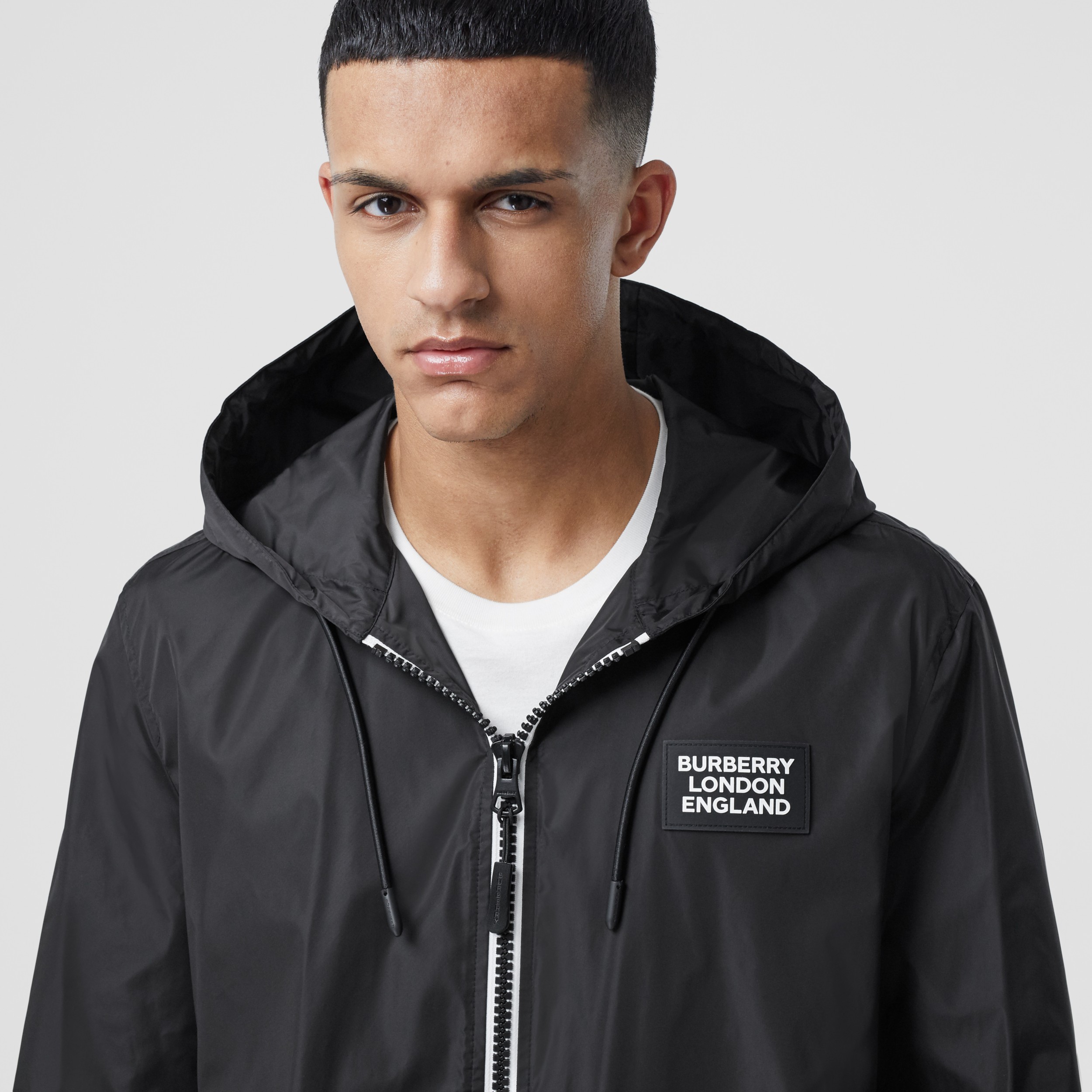 Logo Appliqué ECONYL® Lightweight Hooded Jacket in Black - Men | Burberry