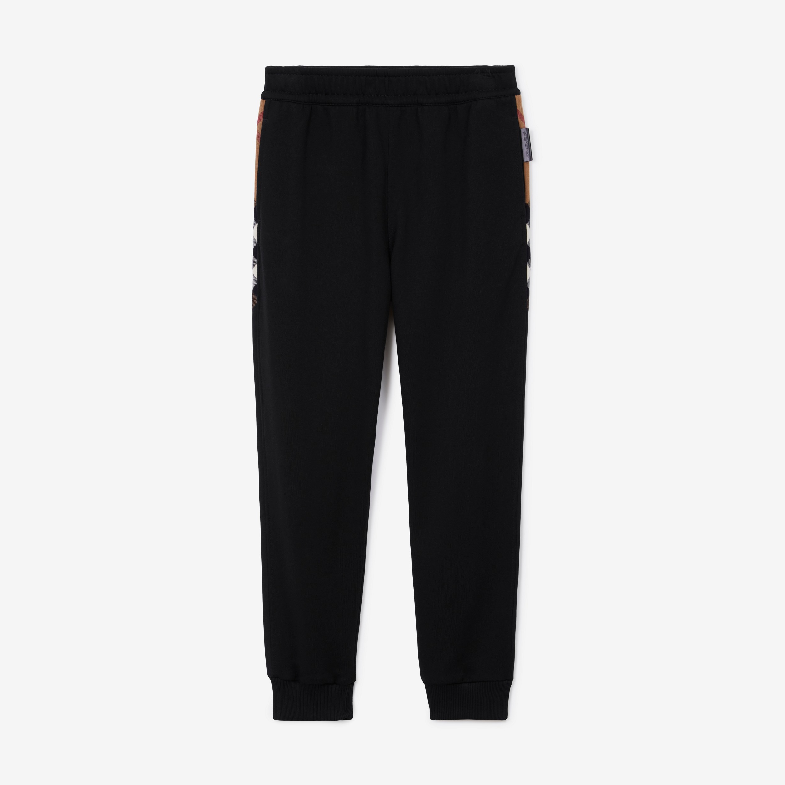 Pantaloni da jogging in cotone con inserti con motivo tartan (Nero) | Sito ufficiale Burberry® - 1