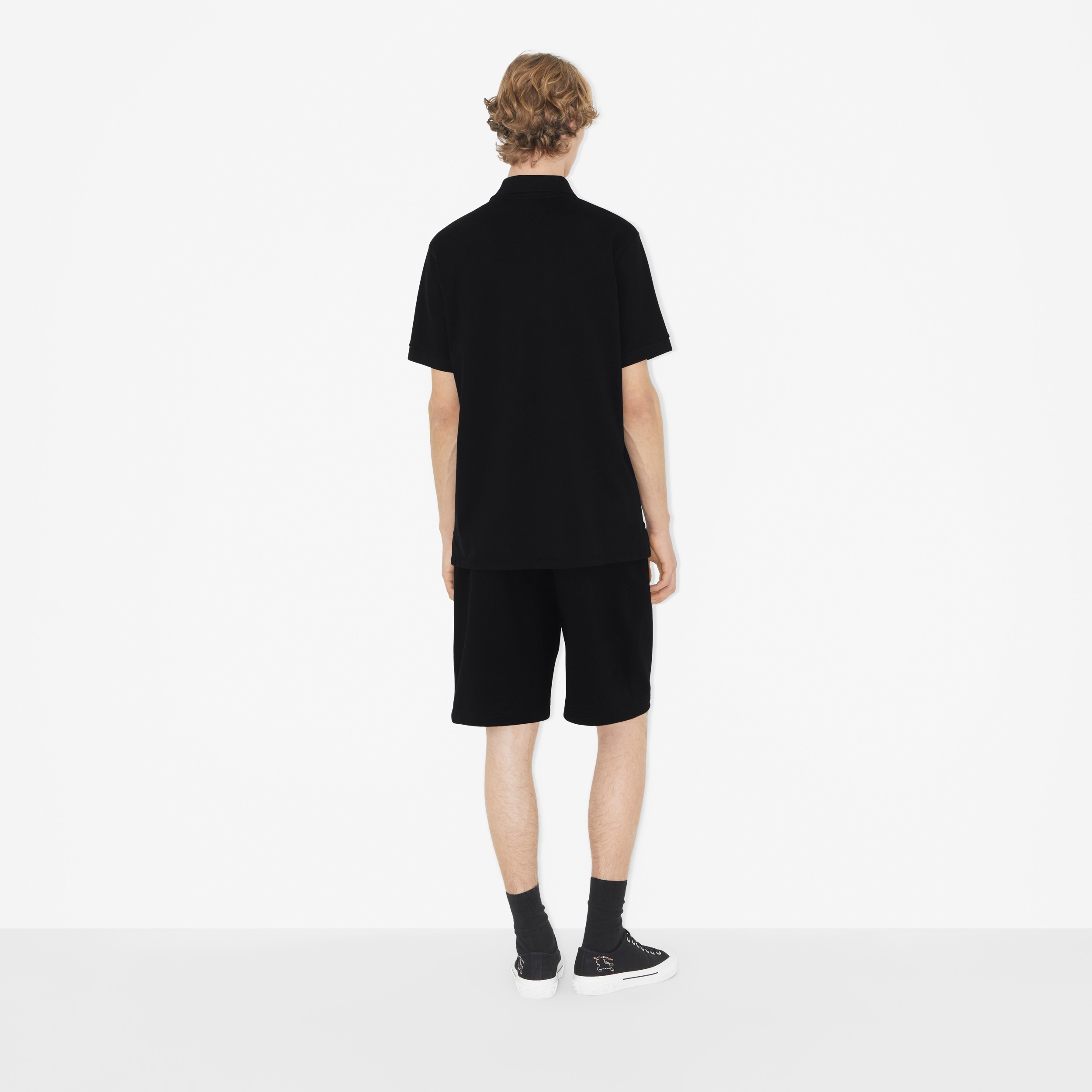 Check EKD Cotton Piqué Polo Shirt in Black - Men | Burberry® Official