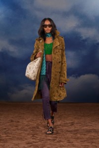 Burberry SS26 Show model Blayse Jennings wearing a Paisley perforated suede trench coat and a Paisley perforated leather Bridle tote