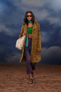 Burberry SS26 Show model Blayse Jennings wearing a Paisley perforated suede trench coat and a Paisley perforated leather Bridle tote