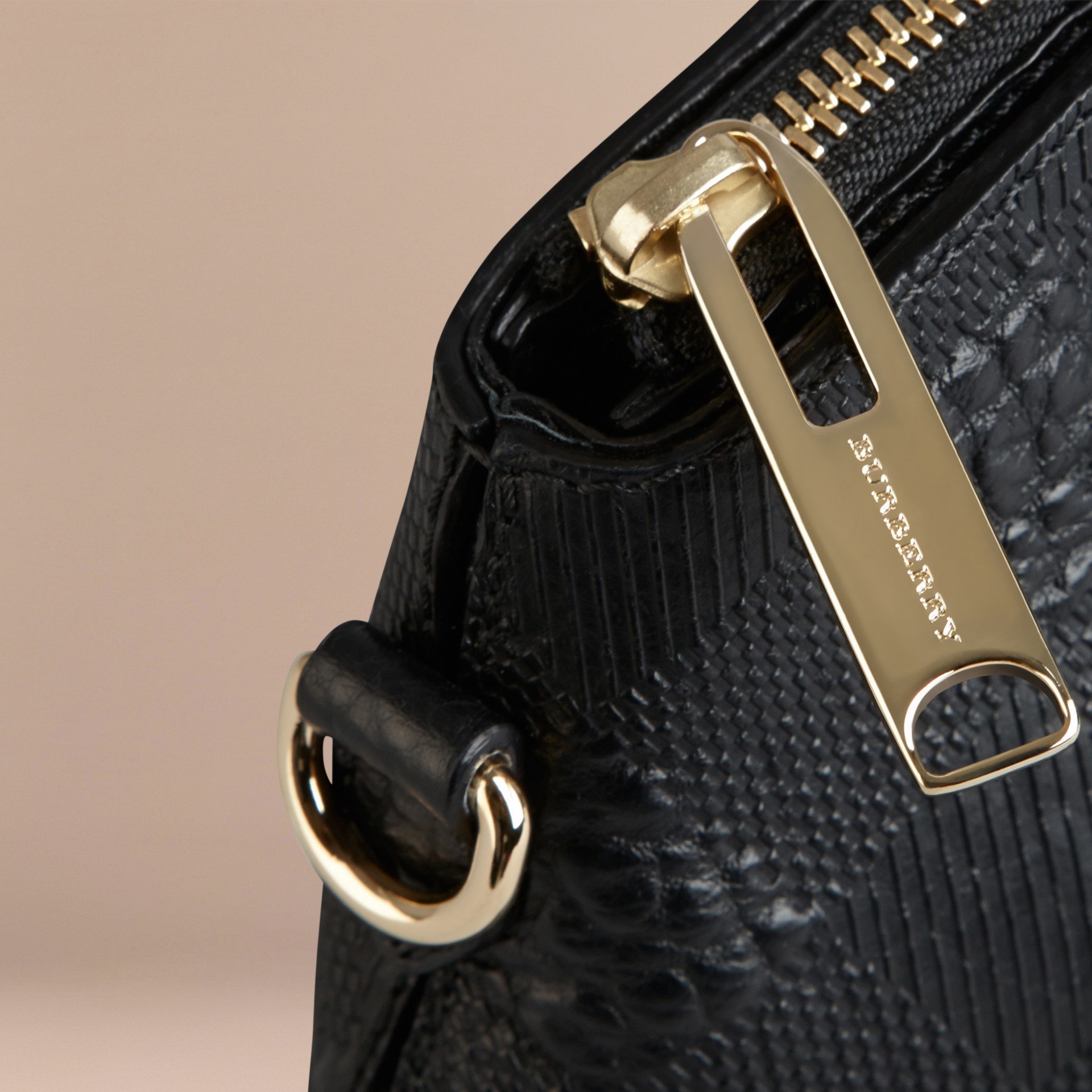 Small Embossed Check Leather Clutch Bag in Black - Women | Burberry ...