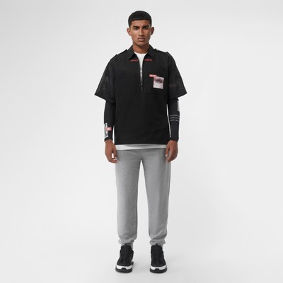 polo shirt and track pants