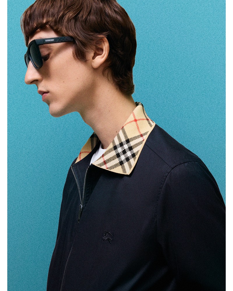 Shot of model wearing Gabardine Glenfields Harrington Jacket in colour Navy