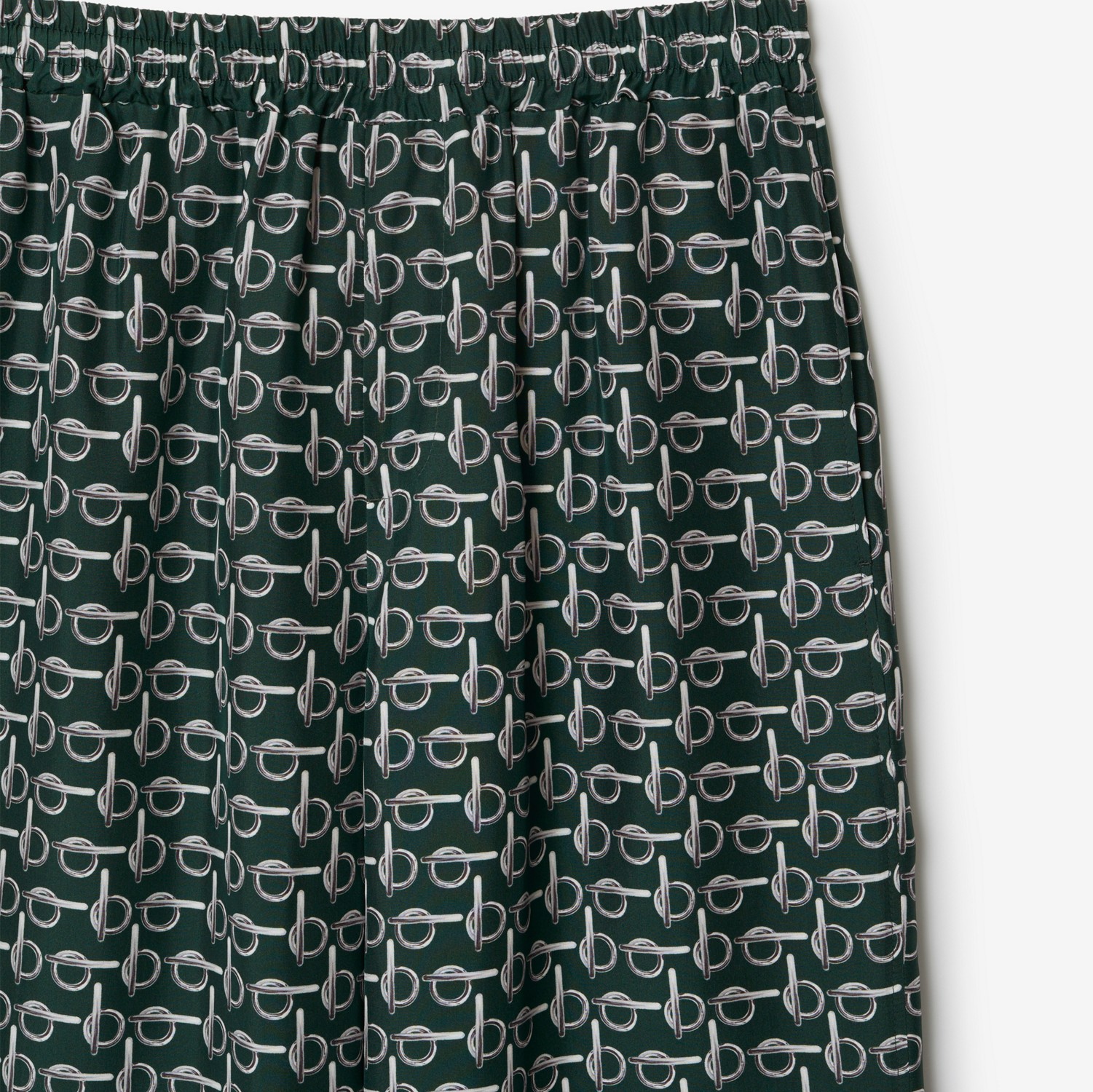 Pantalones en seda con letras B