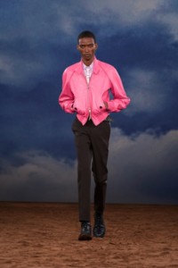 Burberry SS26 Show model Samuel Elie wearing a pink Leather bomber jacket and Embroidered wool silk tailored trousers