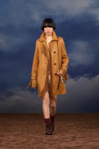 Burberry SS26 Show model Asako Sato wearing a Fringed leather car coat and Waxed suede Ledger boots