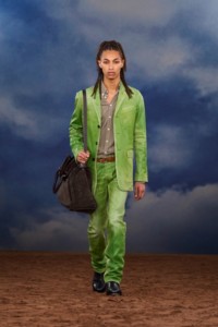 Burberry SS26 Show model Malik Derdak wearing a green Coated denim tailored jacket and jeans