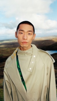 Winter Campaign 2023 featuring model wearing the Cotton Gabardine Overshirt in hunter