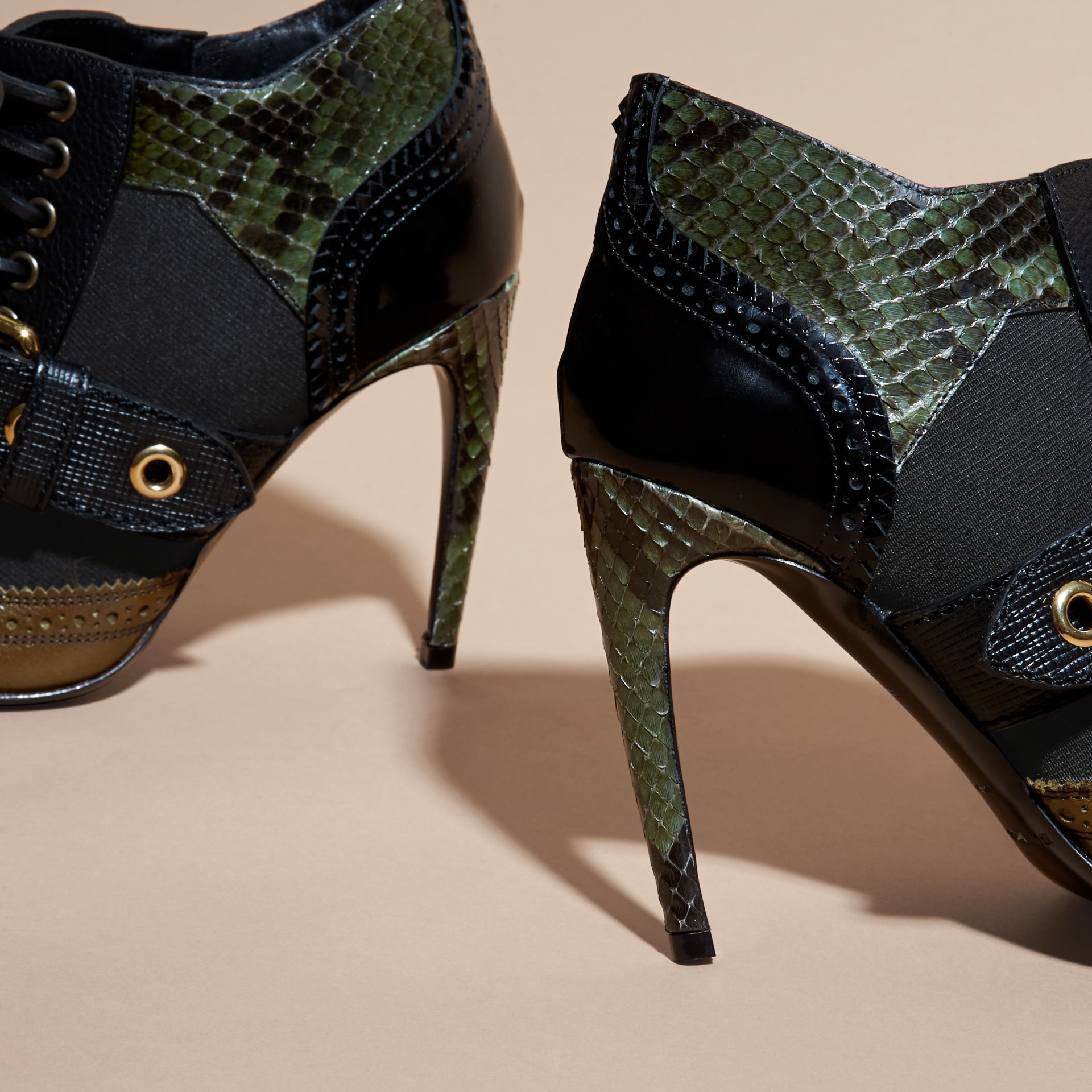 snakeskin buckle boots