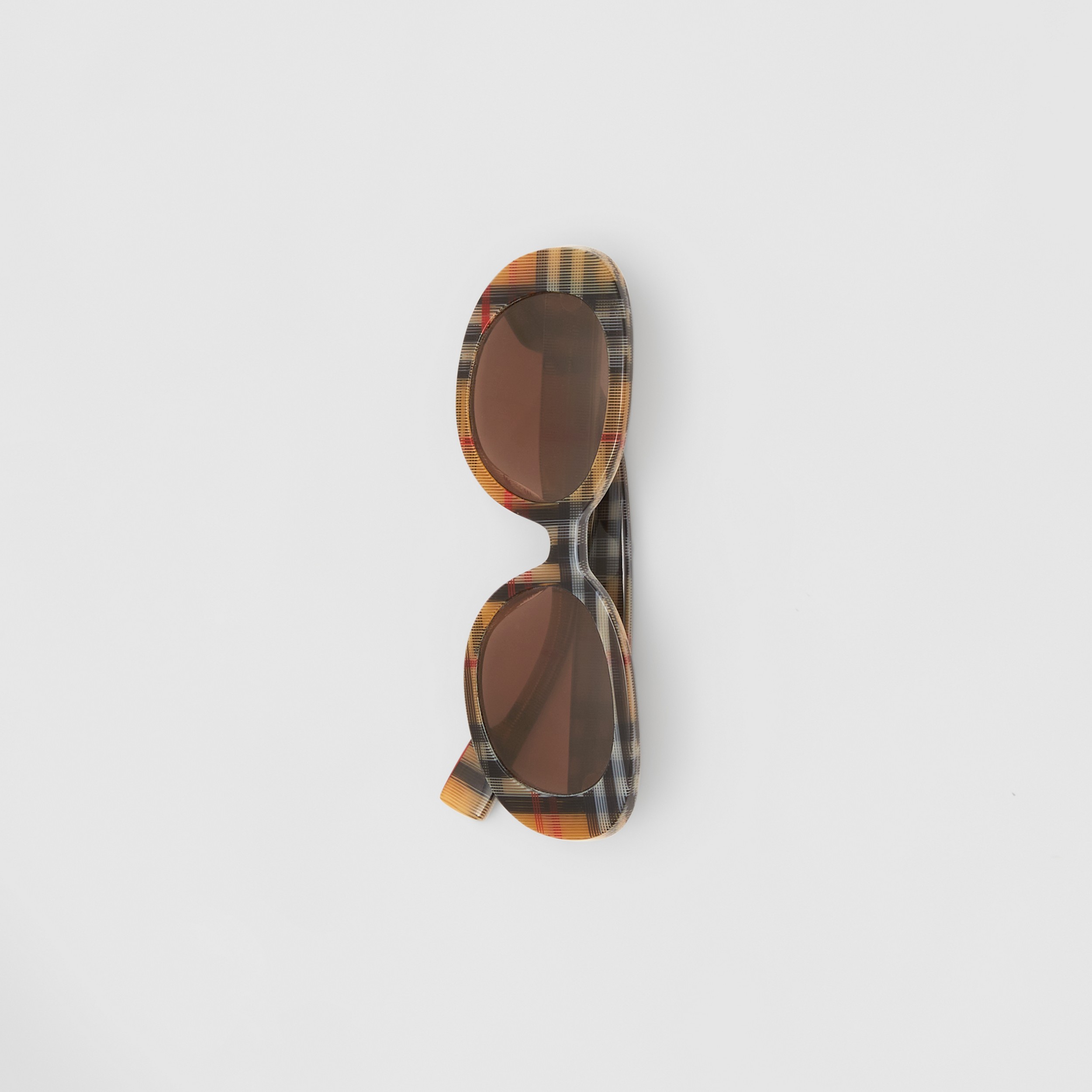 Óculos de sol com armação oval em Vintage Check (Amarelo Antigo) - Crianças | Burberry® oficial - 3