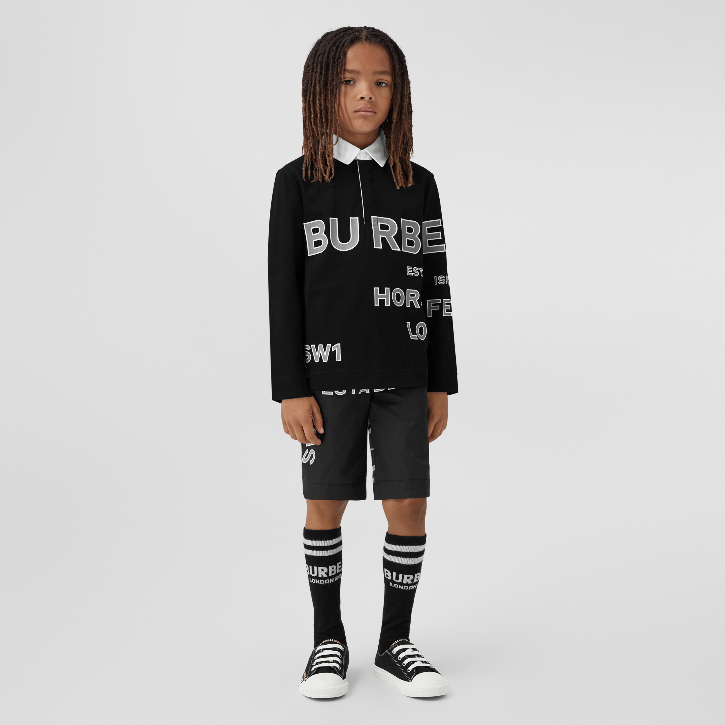 Langarm-Poloshirt aus Baumwolle mit Horseferry-Schriftzug (Schwarz) - Kinder | Burberry® - 3