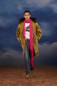 Burberry SS26 Show model Alexis Tiem wearing a Daisy logo cotton T-shirt and a Waxed cotton parka