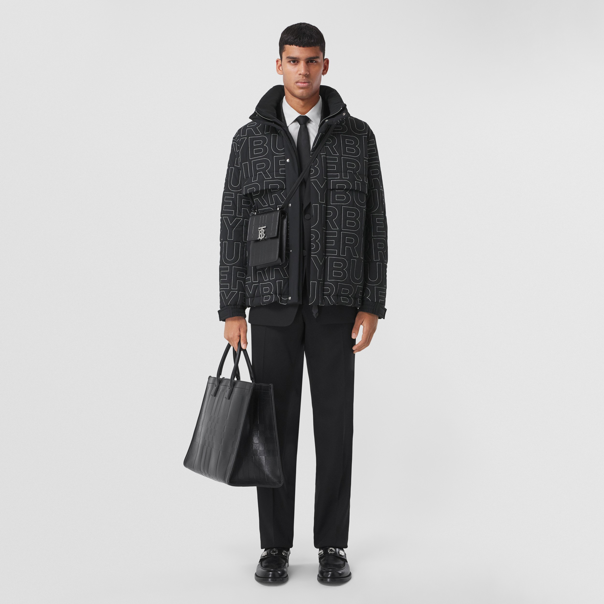 Embroidered Logo Packaway Hood Stretch Nylon Jacket in Black - Men | Burberry® Official - 1