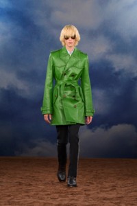 Burberry SS26 Show model Truman Hickey wearing a green Leather trench coat and Embroidered wool silk tailored trousers