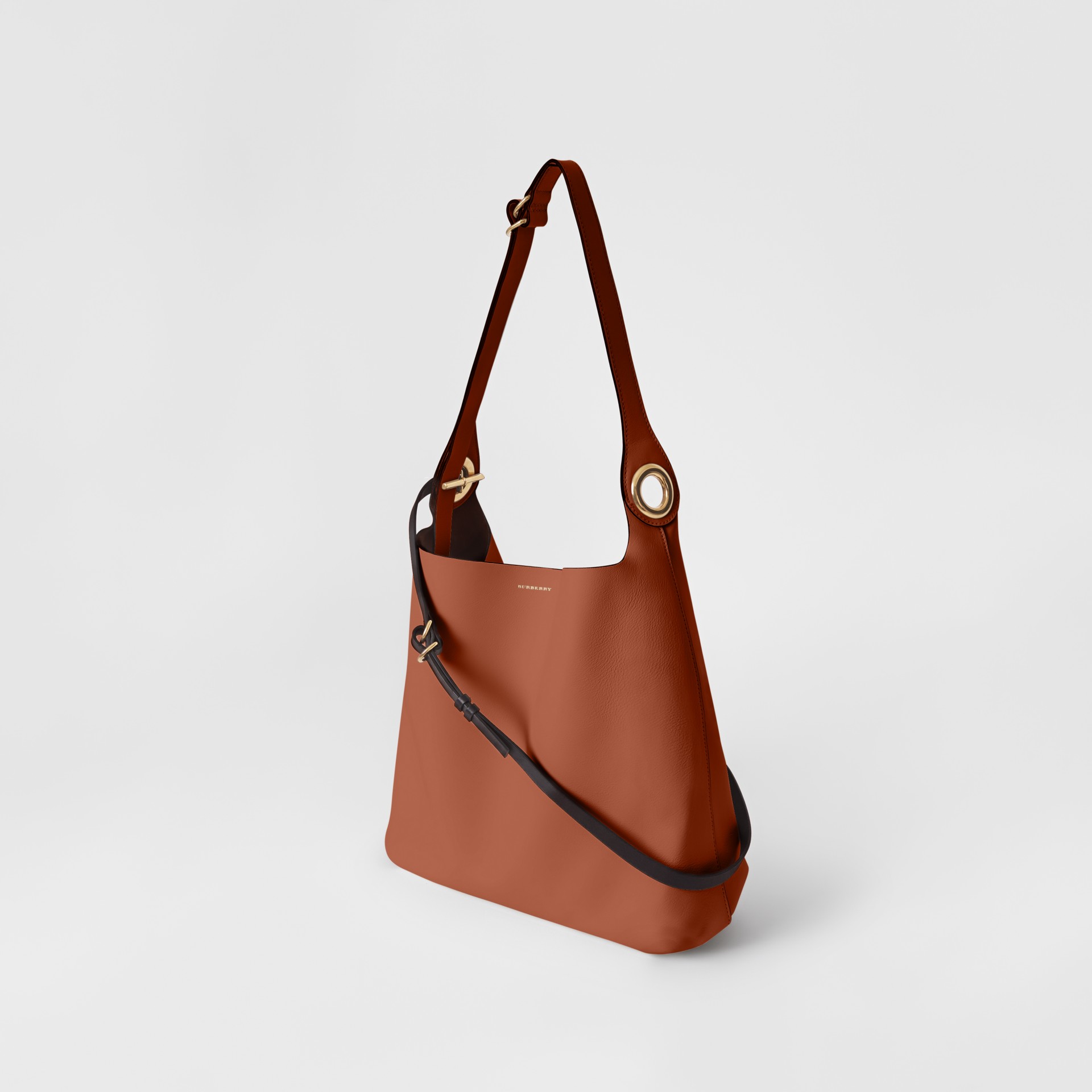 grommet detail strap bag