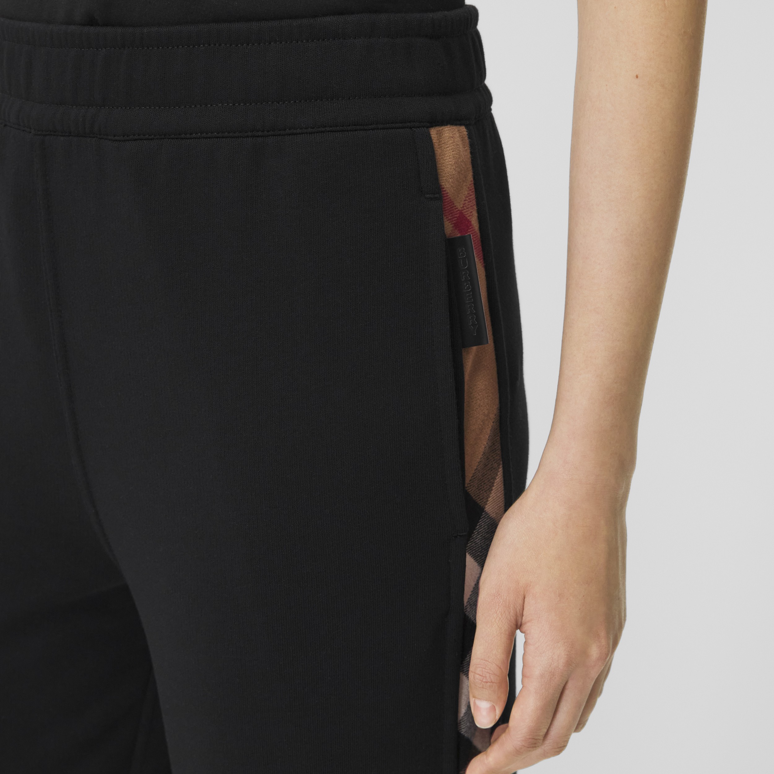 Pantaloni da jogging in cotone con inserti con motivo tartan (Nero) | Sito ufficiale Burberry® - 2
