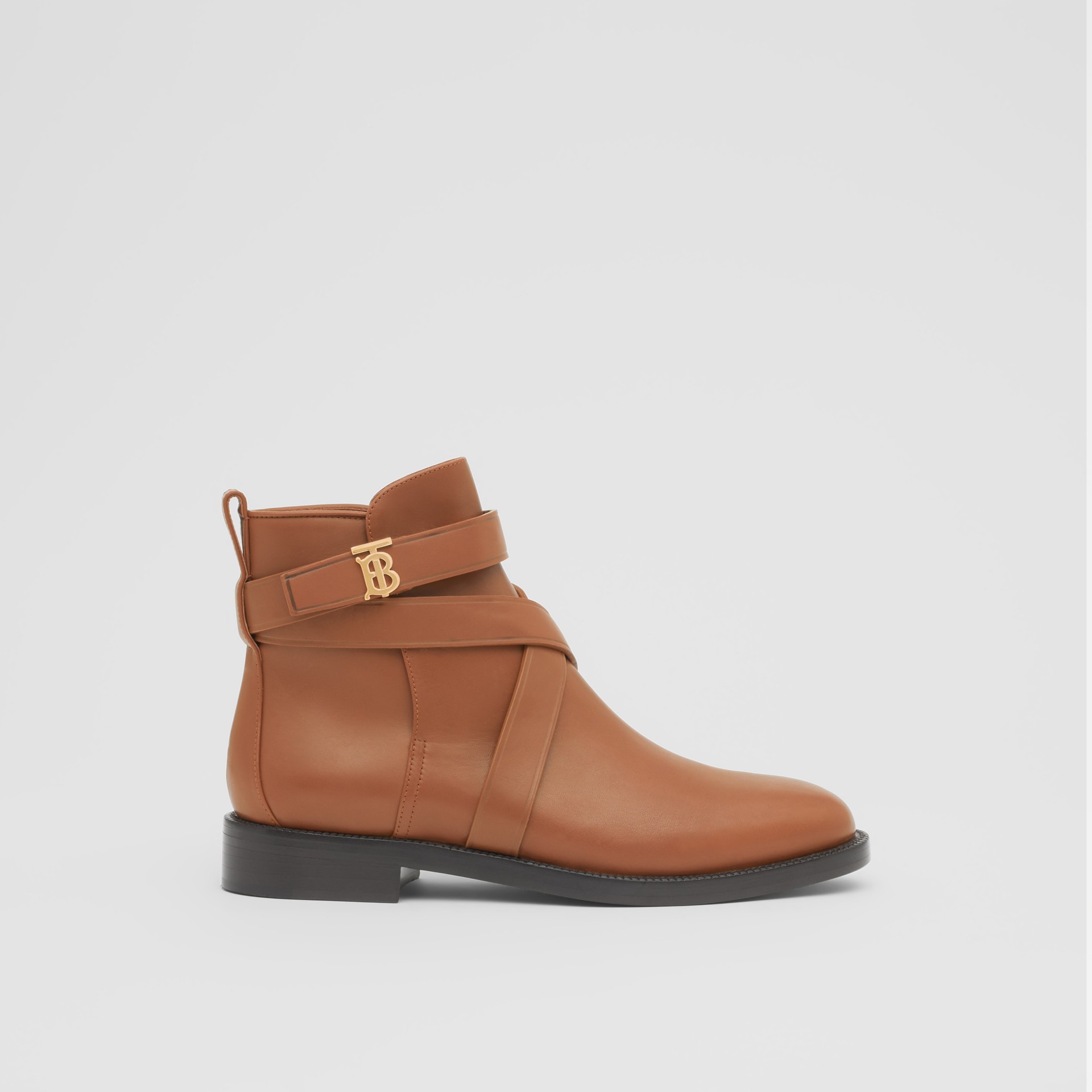 monogram buckle cleat ankle boots