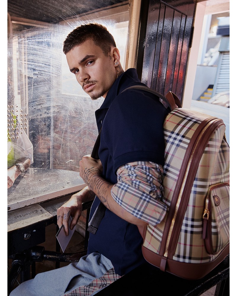 Shot of Romeo Beckham, wearing Burberry Check Backpack