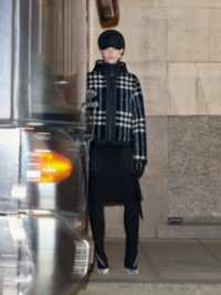 Woman in Burberry Check Coat