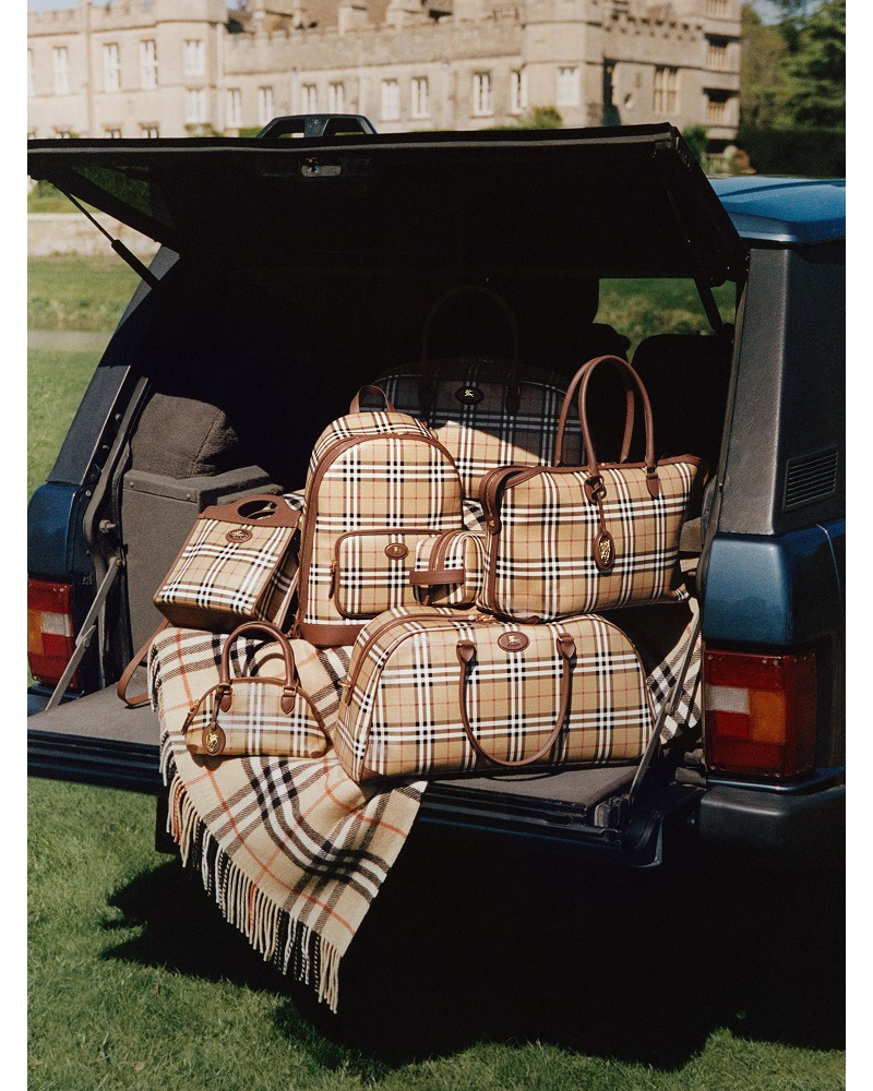 Group shot of Burberry Check bags, including the Mini/Small Primrose bag, the Small/Medium Zip Tote bag, the Check Backpack and the Small Pocket bag