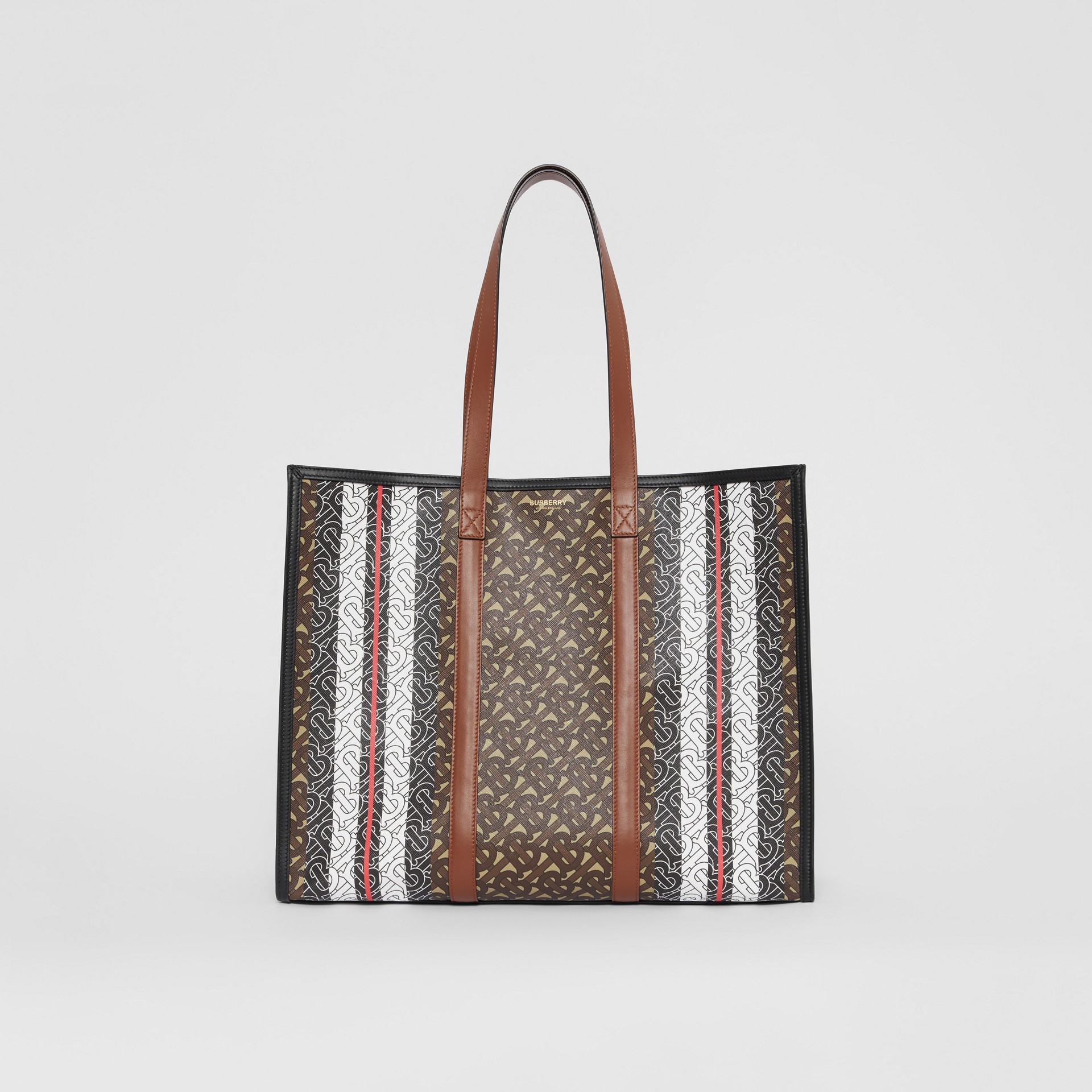 Monogram Stripe E Canvas Tote Bag In Bridle Brown Burberry