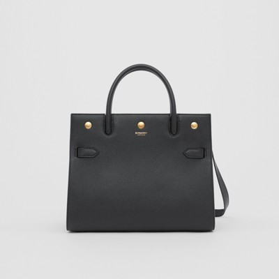 black handle bag