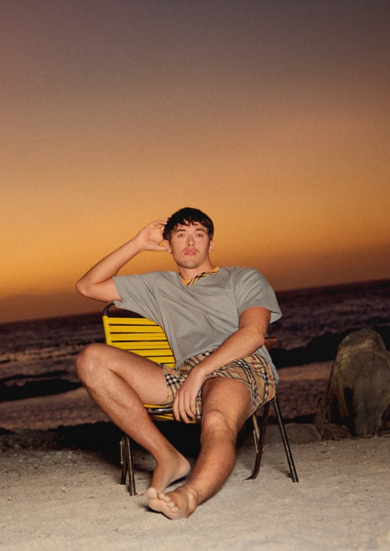 Shot of model, wearing the Check Trim Cotton T-shirt in colour Forest Grey