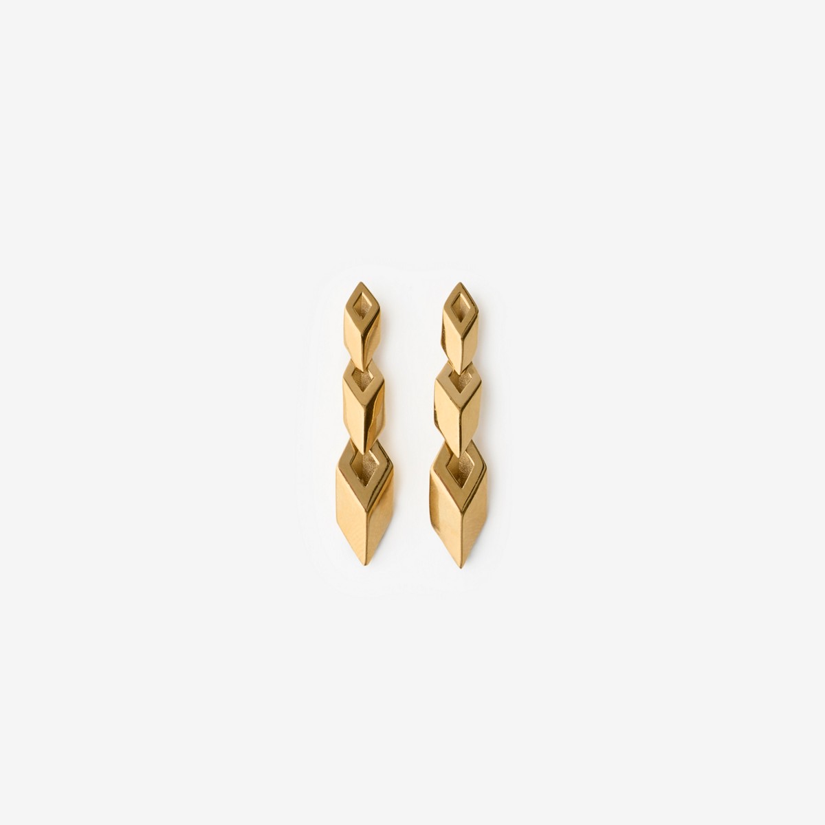 Shop Burberry Hollow Drop Earrings In Gold