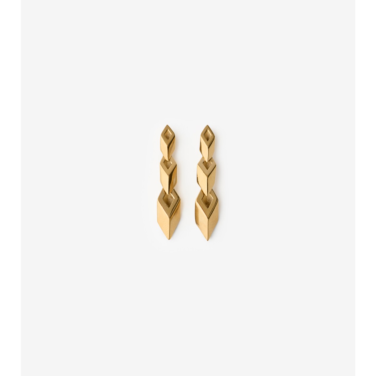 Shop Burberry Hollow Drop Earrings In Gold