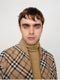 Model wearing Burberry Check Jacket with Rollneck Jumper