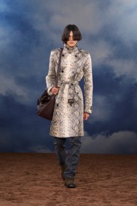 Burberry SS26 Show model Billy Deutrom wearing a Python print trench coat and Leather extra large Hampstead tote