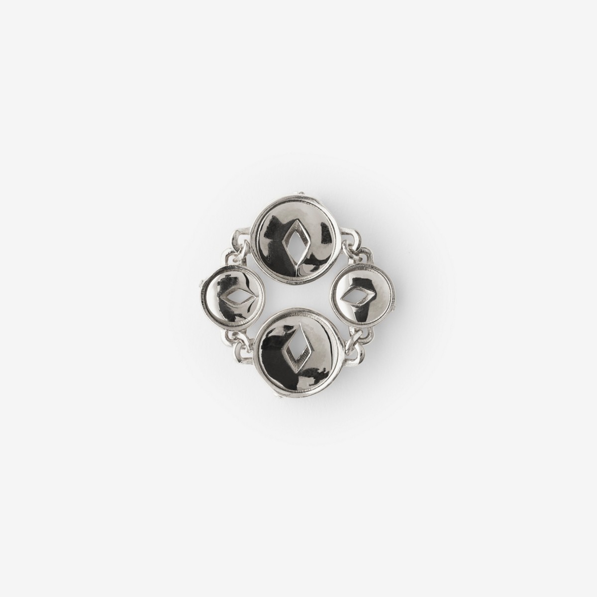 Shop Burberry Hollow Medallion Ring In Silver
