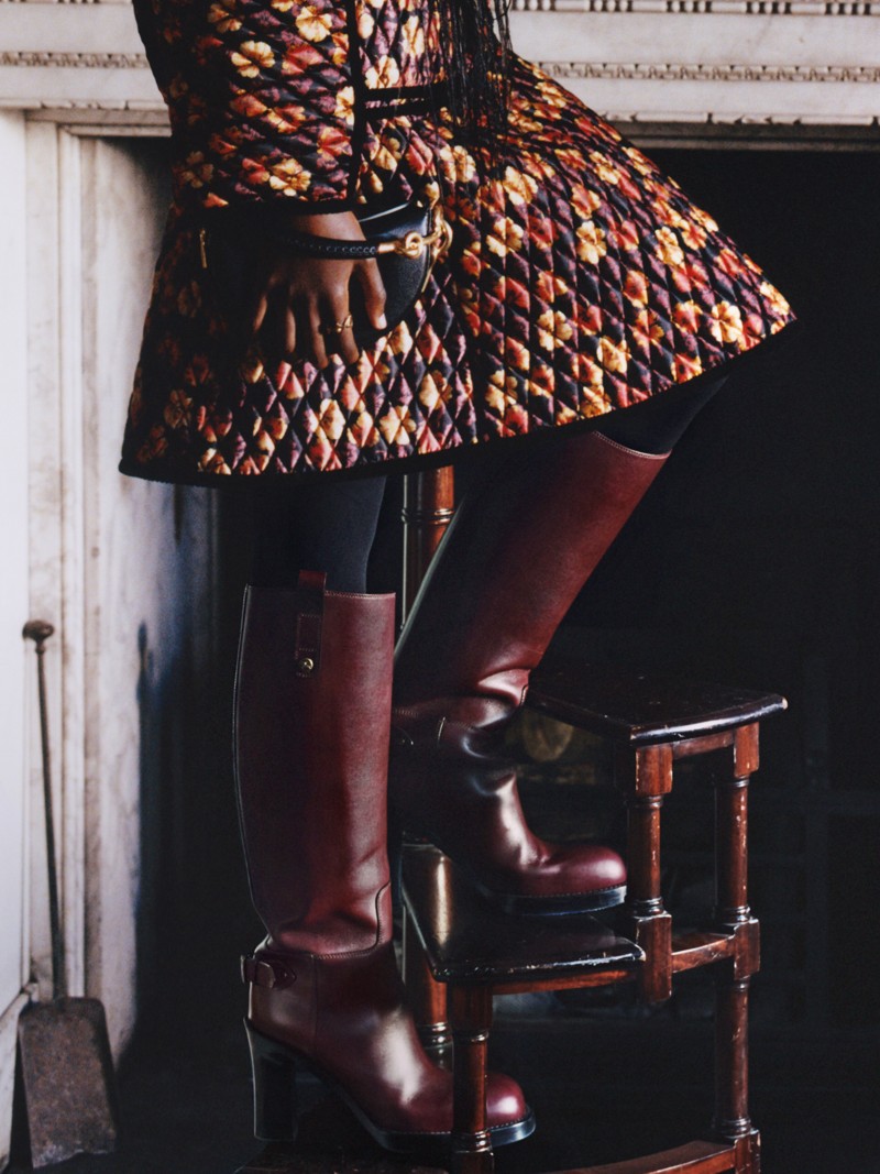 Shot of model wearing the Burberry Leather Cavalier Thigh-high Heel Boots in colour Treacle Brown, from the Winter Runway Collection